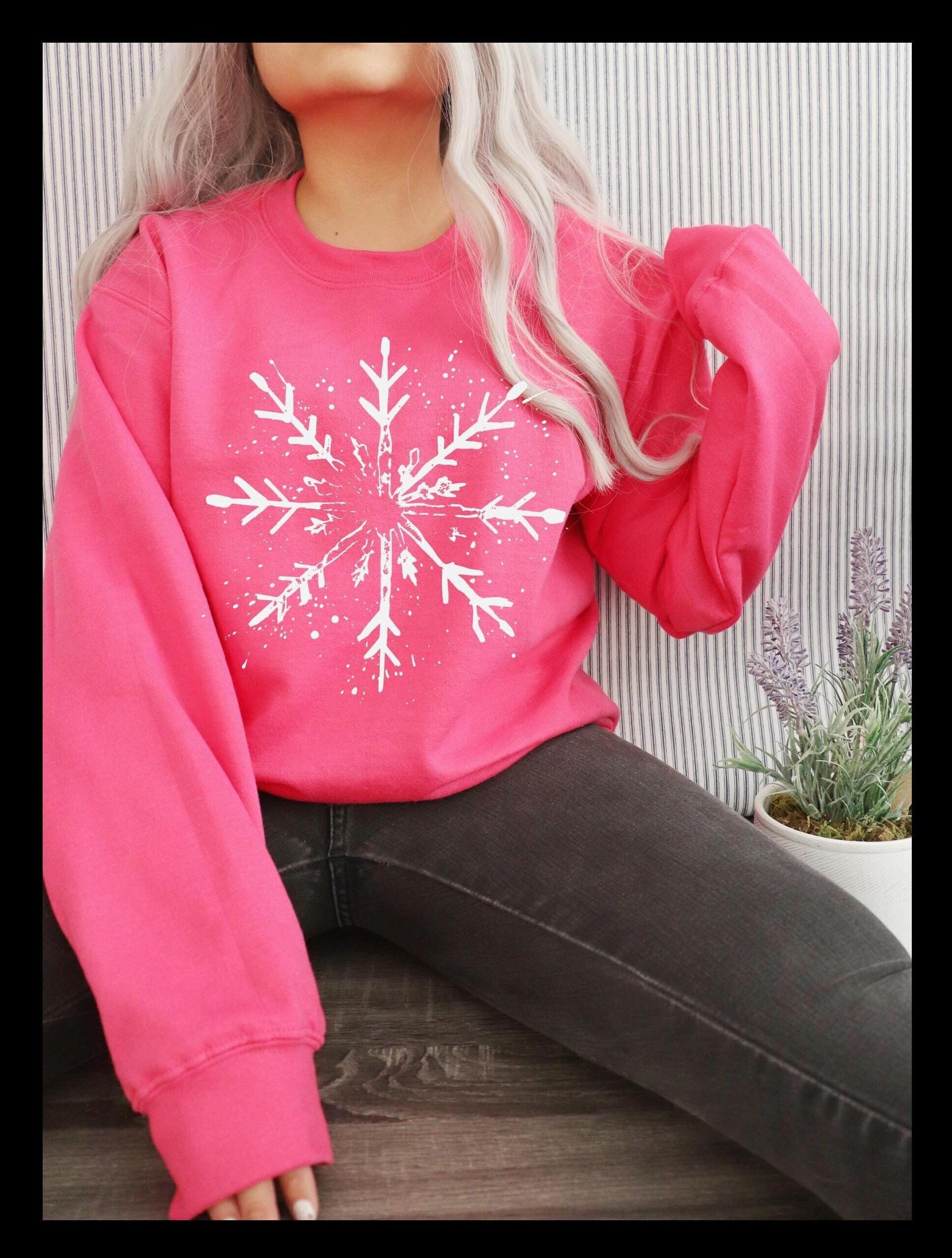 Fun, vintage-style splattered snowflake sweatshirt.